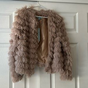 Jacket/cardigan light pink/beige color. Fluffy. Medium